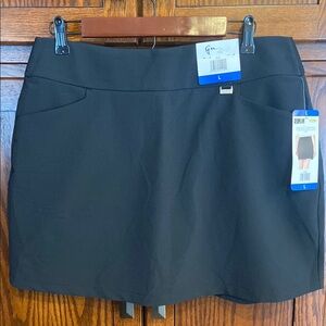 NWT Greg Norman Black Skort with bike short liner, deep front pockets